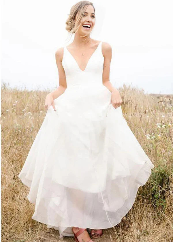 Vestido de novia de playa largo sencillo de gasa sin mangas con escote en V profundo y corte A